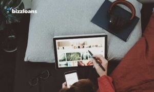 business woman using canva on tablet